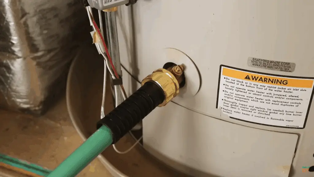 Drain hose flushing a tank